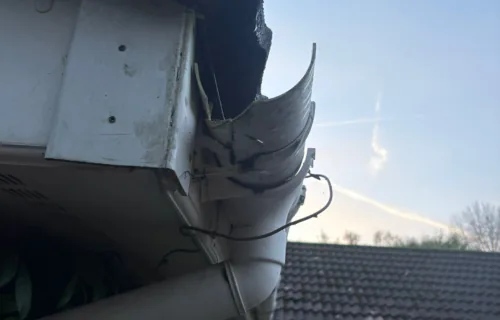 Damaged gutter repair and maintenance carried out by WWR Roofing on a residential property