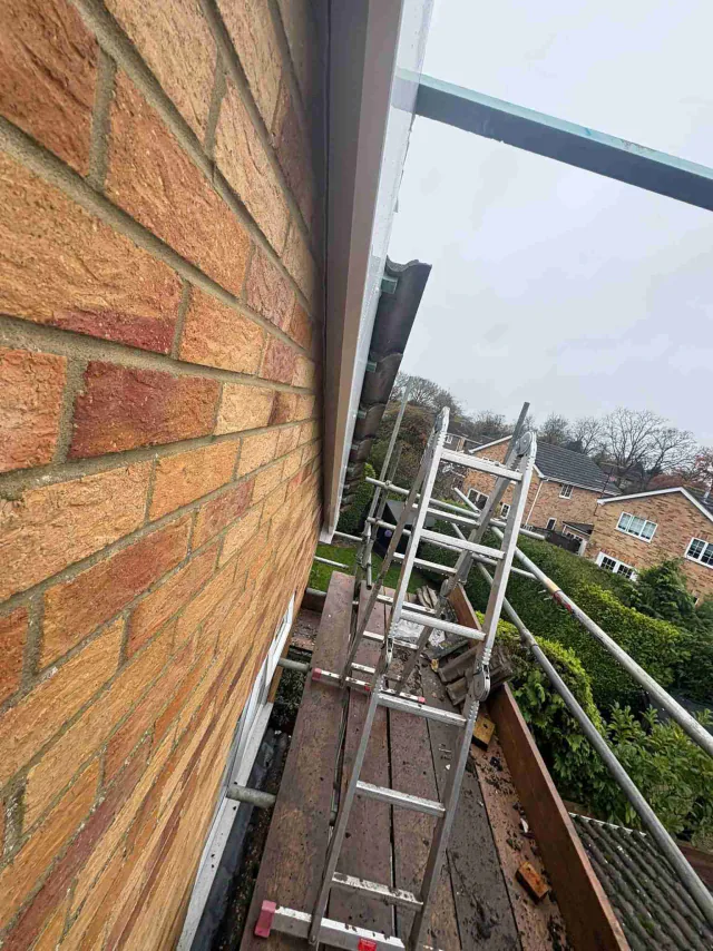 Fascia board beneath a roof edge