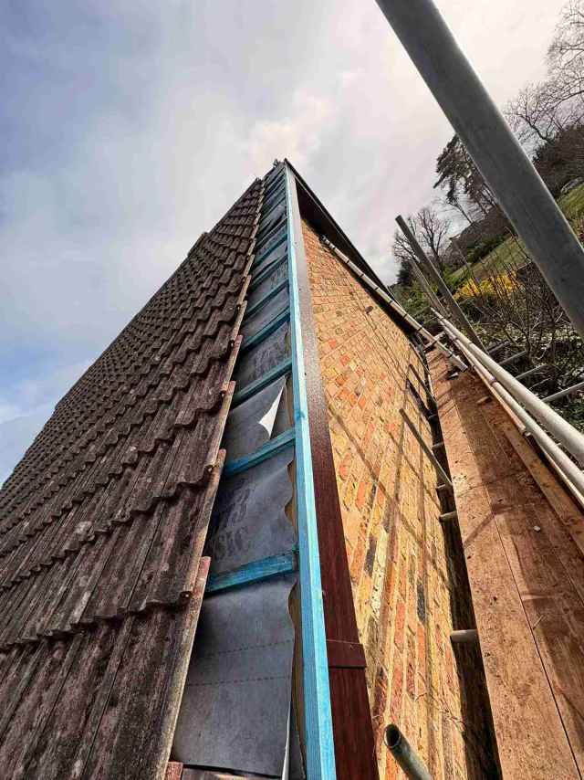 Fascia board beneath a roof edge