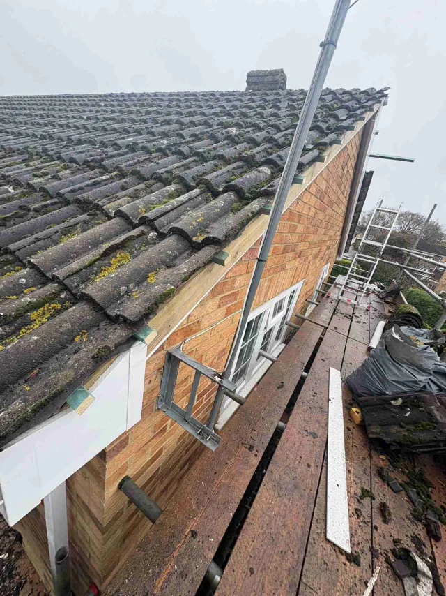 Fascia board beneath a roof edge
