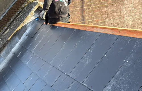 Tile and slate roof repair by WWR Roofing on a residential property