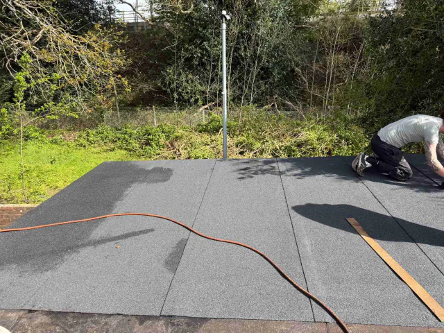Flat roof surface during roofing work