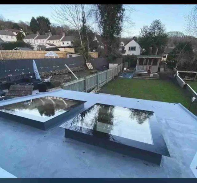 Flat roof with two glazed rooflights