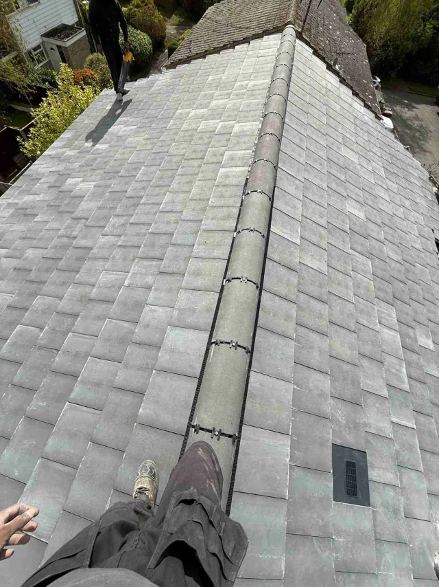 Grey roof slopes meeting at a ridge