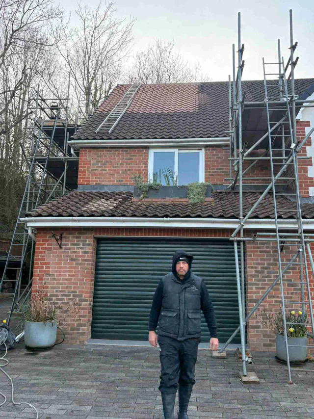 Scaffolding around a house and garage