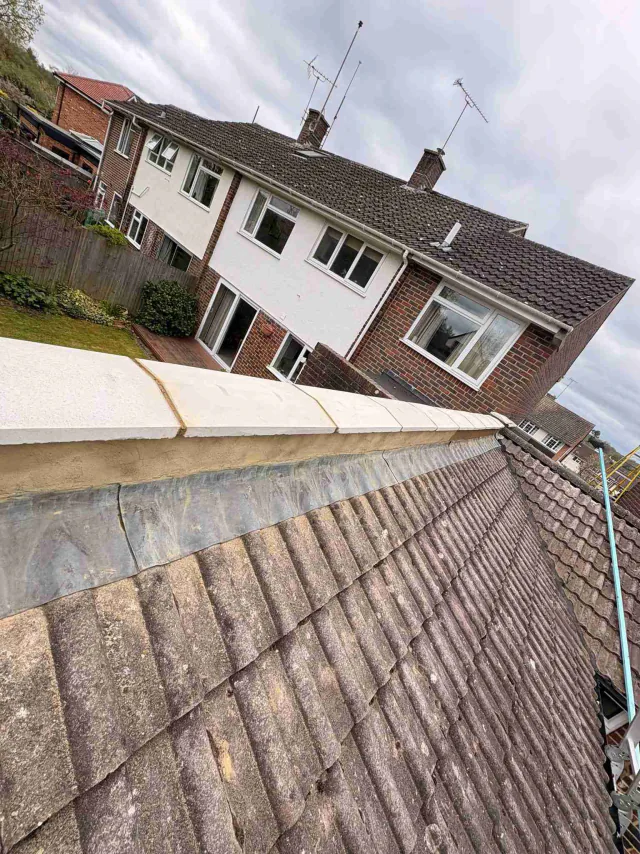 Tiled roof with ridge tiles