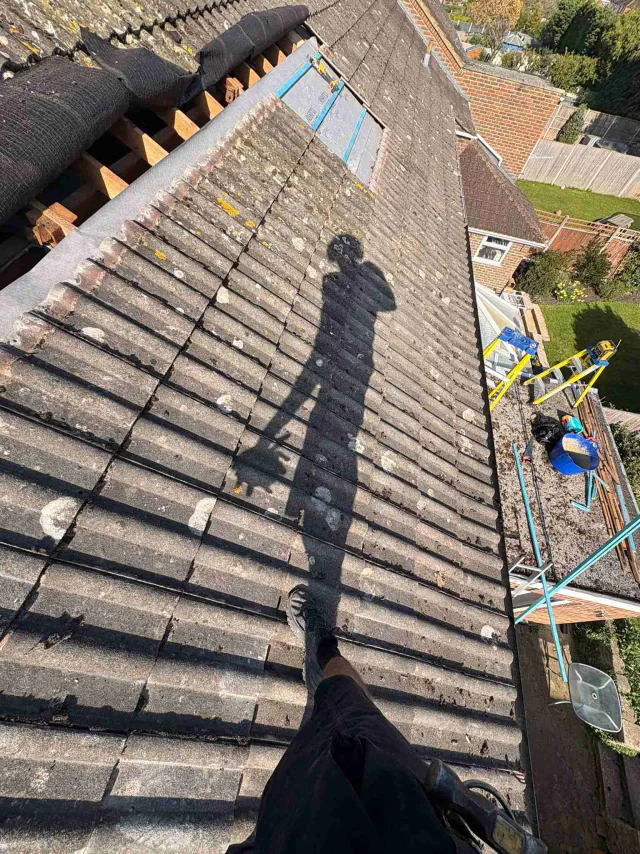 Tiled roof with ridge tiles