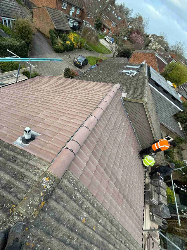Tiled roof with ridge tiles