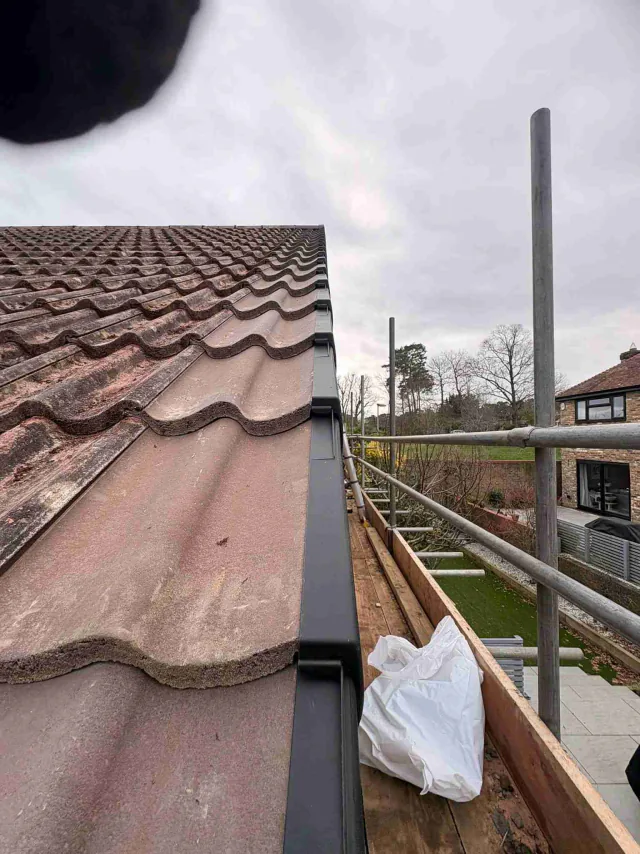 Tiled roof with ridge tiles